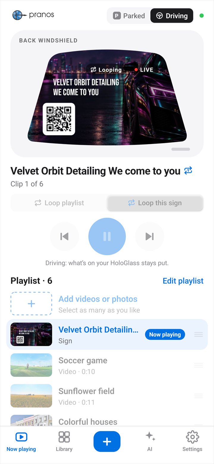 Now playing set to Driving: the play controls are dimmed, the app says what’s on your HoloGlass stays put, and the playlist is below