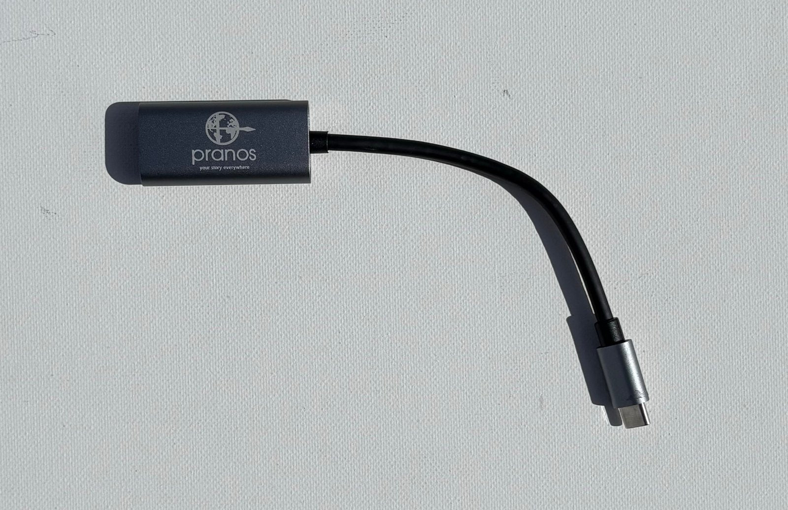 The PRANOS HDMI phone adapter for screen mirroring, included in every kit